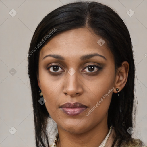 Joyful latino young-adult female with long  black hair and brown eyes