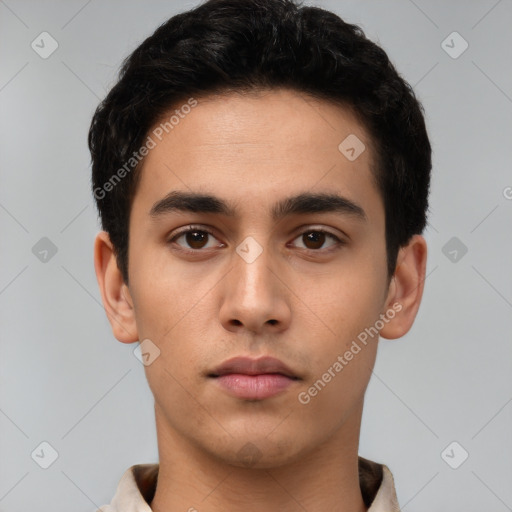 Neutral latino young-adult male with short  black hair and brown eyes