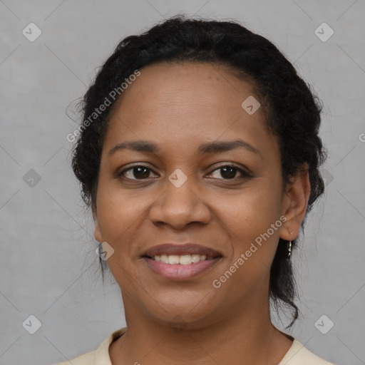 Joyful latino young-adult female with short  black hair and brown eyes