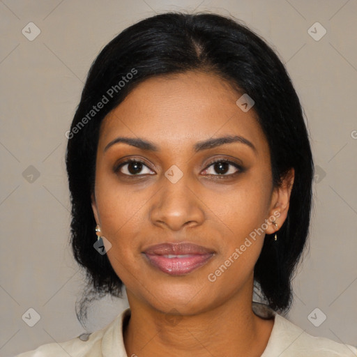 Joyful black young-adult female with medium  black hair and brown eyes