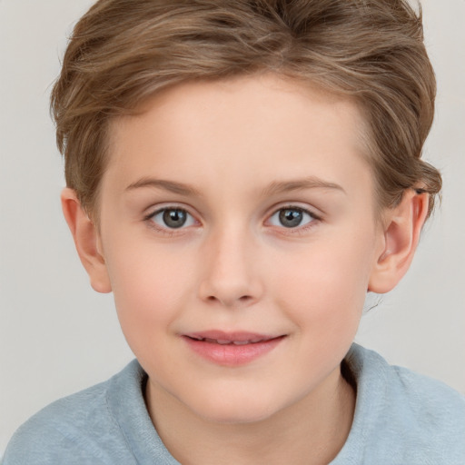 Joyful white child female with short  brown hair and grey eyes