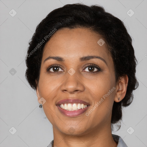 Joyful latino young-adult female with medium  black hair and brown eyes