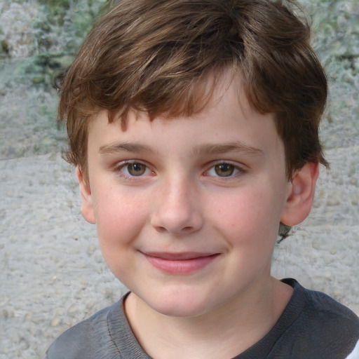 Joyful white child male with short  brown hair and grey eyes