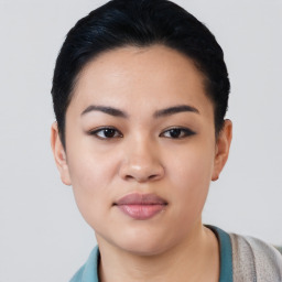 Joyful asian young-adult female with short  black hair and brown eyes