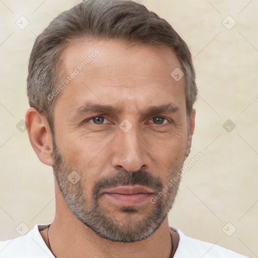 Neutral white adult male with short  brown hair and brown eyes