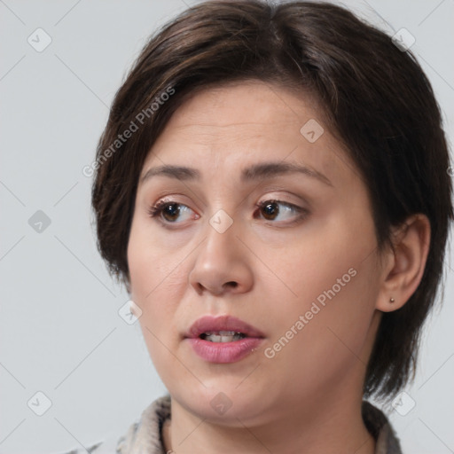 Neutral white young-adult female with medium  brown hair and brown eyes