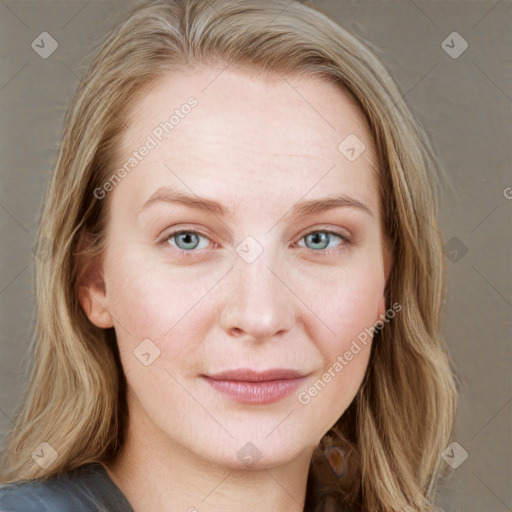 Joyful white young-adult female with long  brown hair and blue eyes