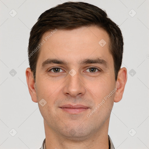 Joyful white young-adult male with short  brown hair and brown eyes