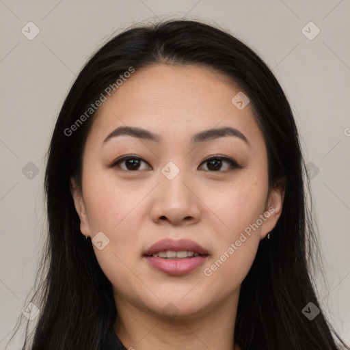 Joyful asian young-adult female with long  black hair and brown eyes