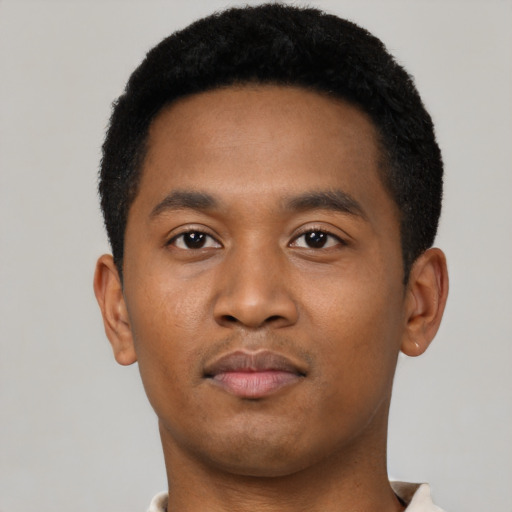 Neutral black young-adult male with short  black hair and brown eyes