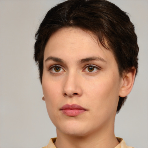 Neutral white young-adult female with short  brown hair and brown eyes