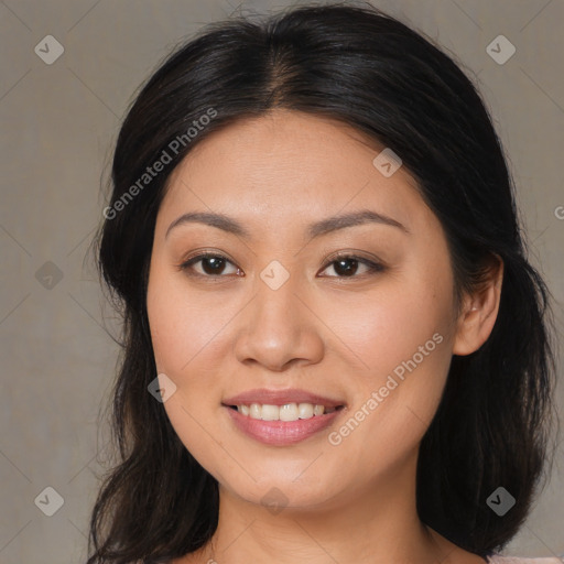 Joyful asian young-adult female with long  brown hair and brown eyes