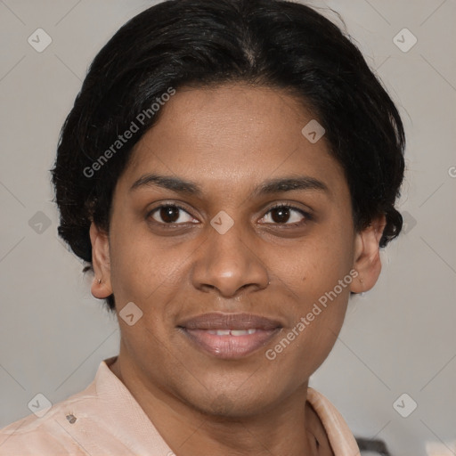 Joyful latino young-adult female with short  brown hair and brown eyes