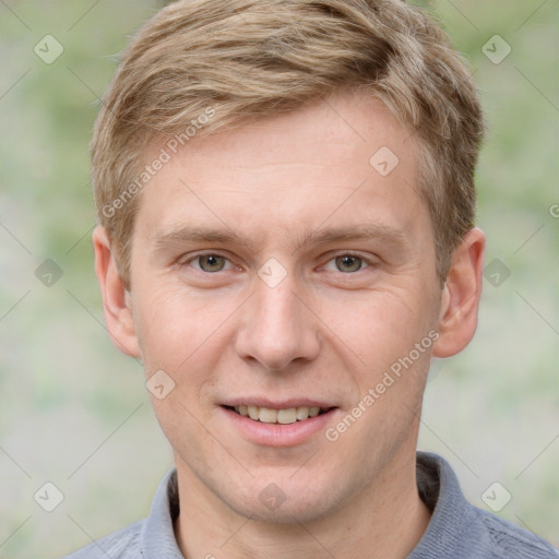 Joyful white adult male with short  brown hair and grey eyes