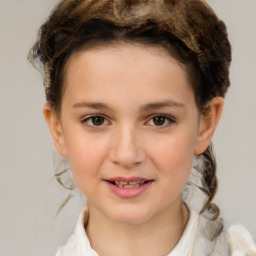 Joyful white child female with short  brown hair and brown eyes