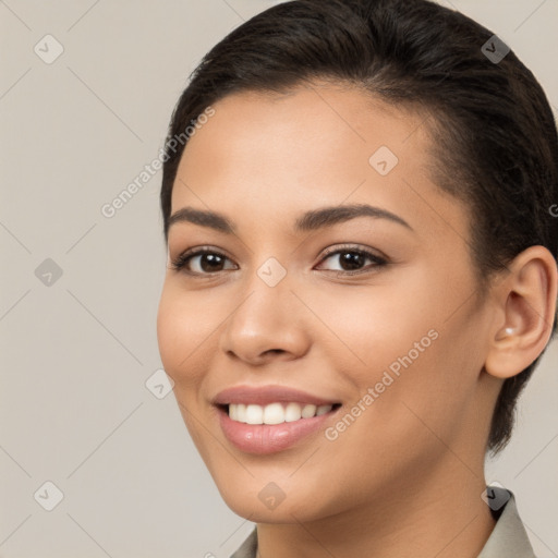 Joyful white young-adult female with long  brown hair and brown eyes