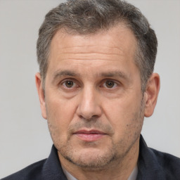 Neutral white middle-aged male with short  brown hair and brown eyes