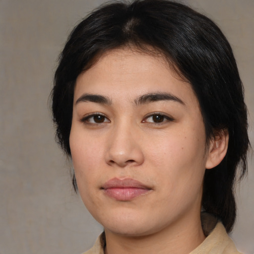 Neutral asian young-adult female with medium  brown hair and brown eyes