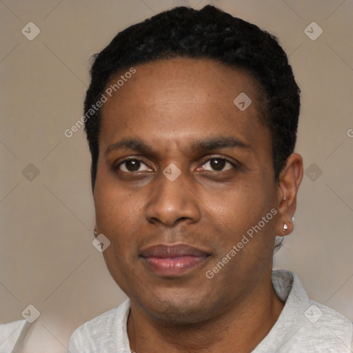 Joyful black young-adult male with short  black hair and brown eyes