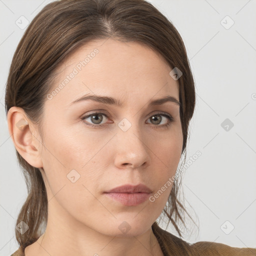 Neutral white young-adult female with long  brown hair and brown eyes