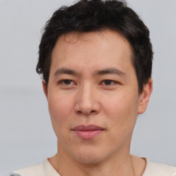 Neutral asian young-adult male with short  brown hair and brown eyes