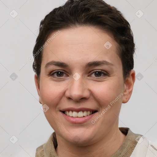 Joyful white young-adult female with short  brown hair and grey eyes