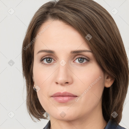 Neutral white young-adult female with medium  brown hair and grey eyes