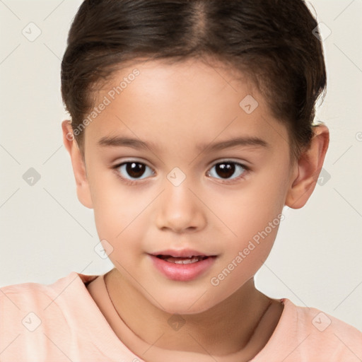 Joyful white child female with short  brown hair and brown eyes