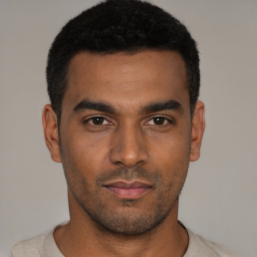 Neutral latino young-adult male with short  black hair and brown eyes