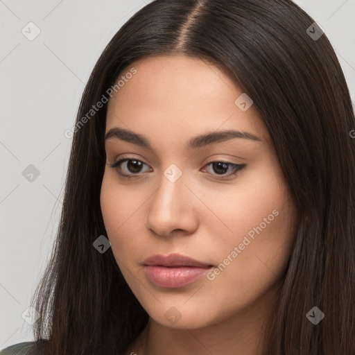 Neutral white young-adult female with long  brown hair and brown eyes