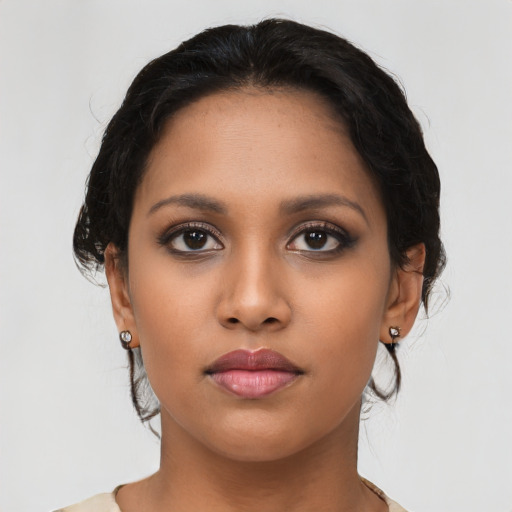 Neutral latino young-adult female with long  brown hair and brown eyes