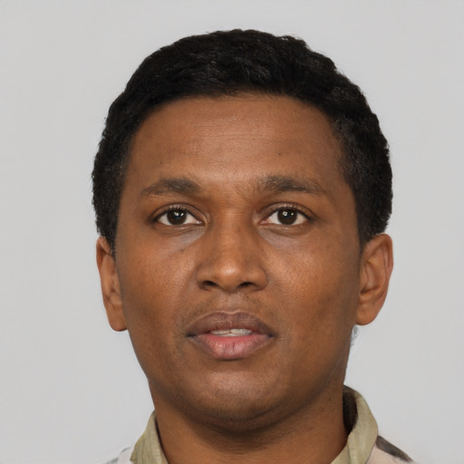 Neutral black young-adult male with short  brown hair and brown eyes