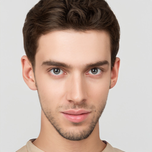 Neutral white young-adult male with short  brown hair and brown eyes