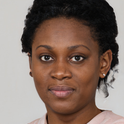 Neutral black young-adult female with short  black hair and brown eyes