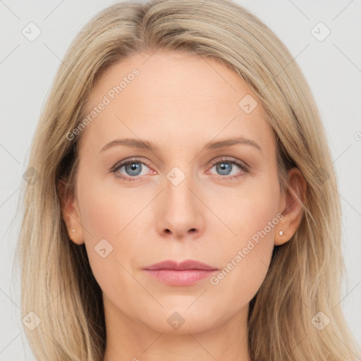 Joyful white young-adult female with long  brown hair and blue eyes