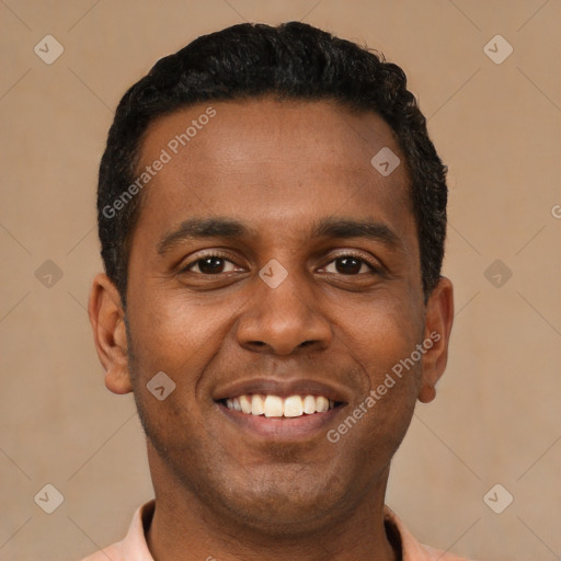 Joyful latino young-adult male with short  black hair and brown eyes