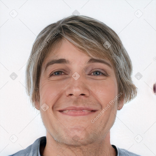 Joyful white adult male with short  brown hair and grey eyes