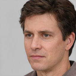 Neutral white adult male with short  brown hair and brown eyes