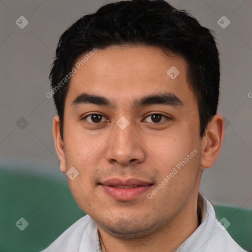 Joyful latino young-adult male with short  black hair and brown eyes
