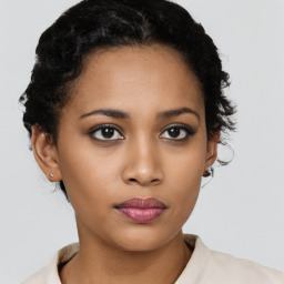 Neutral black young-adult female with short  brown hair and brown eyes