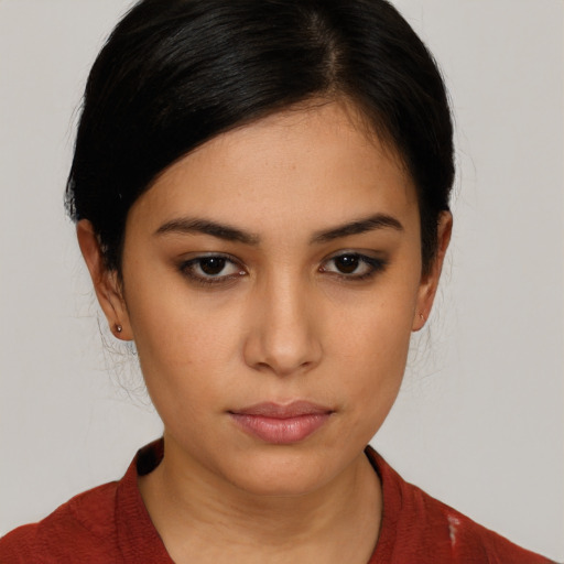 Neutral white young-adult female with short  brown hair and brown eyes