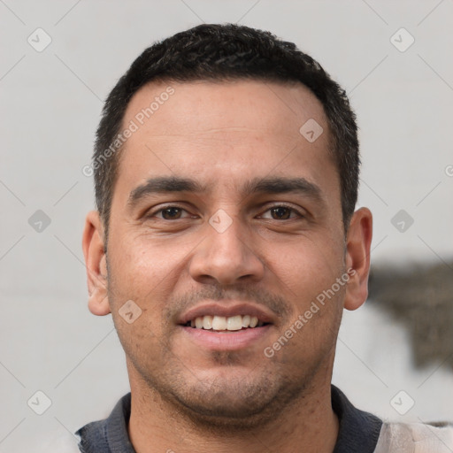 Joyful white young-adult male with short  black hair and brown eyes