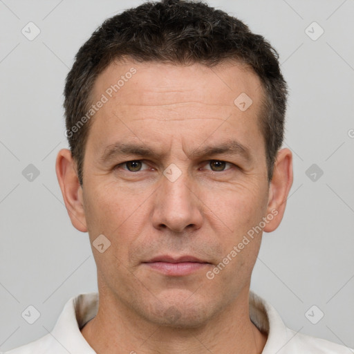 Neutral white adult male with short  brown hair and brown eyes