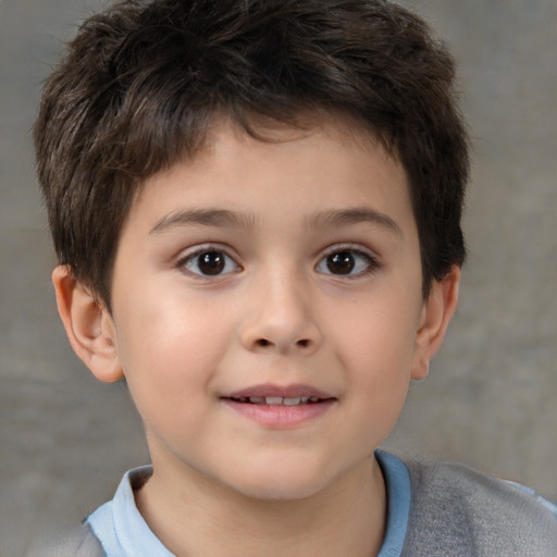 Joyful white child male with short  brown hair and brown eyes