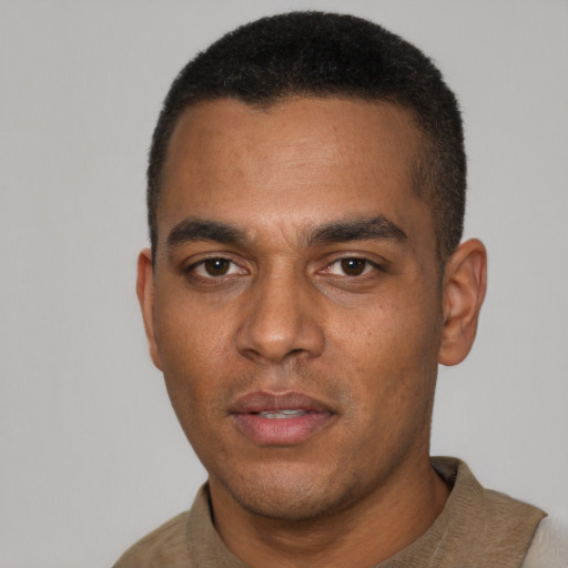 Neutral black young-adult male with short  black hair and brown eyes