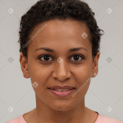 Joyful black young-adult female with short  brown hair and brown eyes