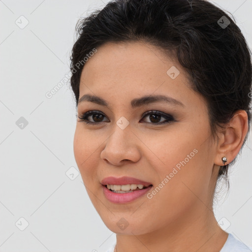 Joyful asian young-adult female with short  brown hair and brown eyes