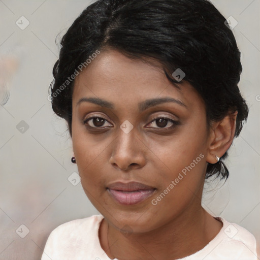 Joyful black young-adult female with medium  black hair and brown eyes