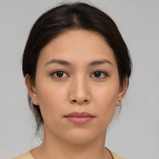 Neutral white young-adult female with medium  brown hair and brown eyes