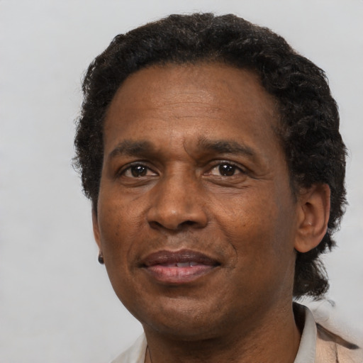 Neutral black adult male with short  black hair and brown eyes